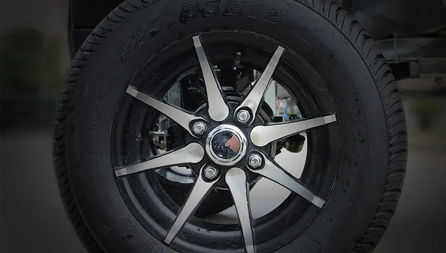 Close-up of Tara Turfman 700 EEC standard tire with road tread, designed for quiet and comfortable driving on paved surfaces