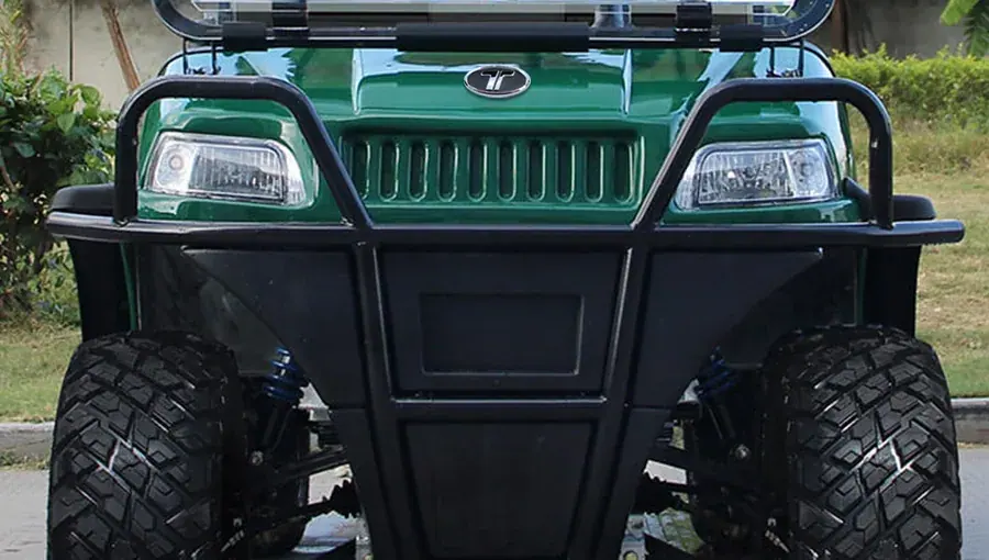 Close-up of the heavy-duty front bumper on Tara Turfman 700, designed to protect the vehicle during rugged use