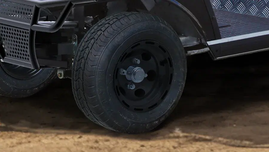 Standard road tread tire on Tara electric golf cart, designed for quiet, stable, and comfortable ride on pavement