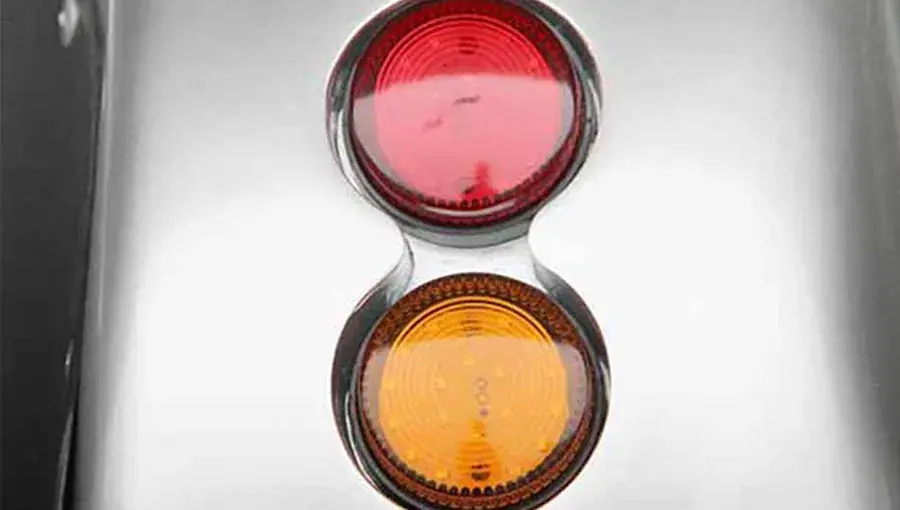 Close-up of Tara golf cart LED taillights, providing clear brake and turn signal indicators

