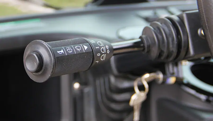 Close-up of approved switches on Tara golf cart dashboard, designed for secure and compliant operation