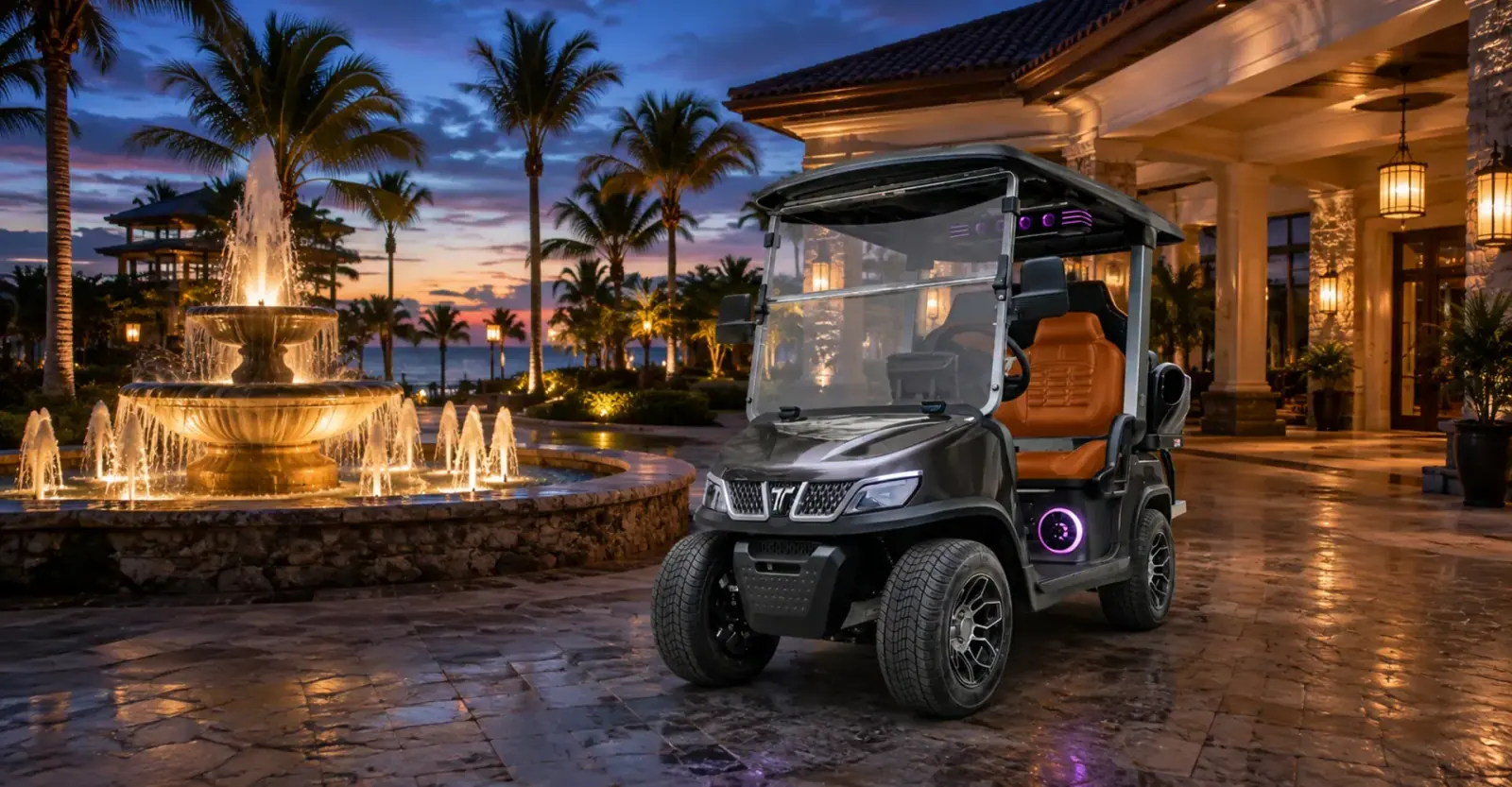 TARA golf cart at a resort entrance in the evening